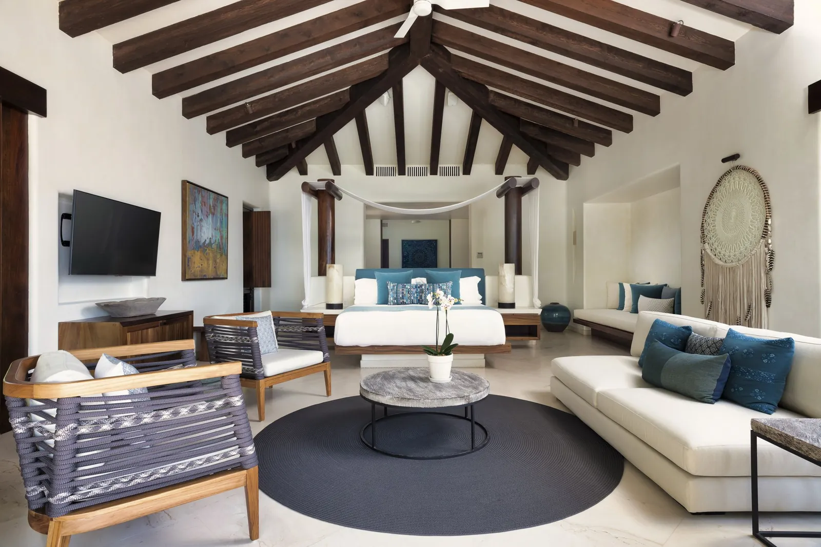 Master Suite 2: the king bedroom under a beamed, vaulted ceiling