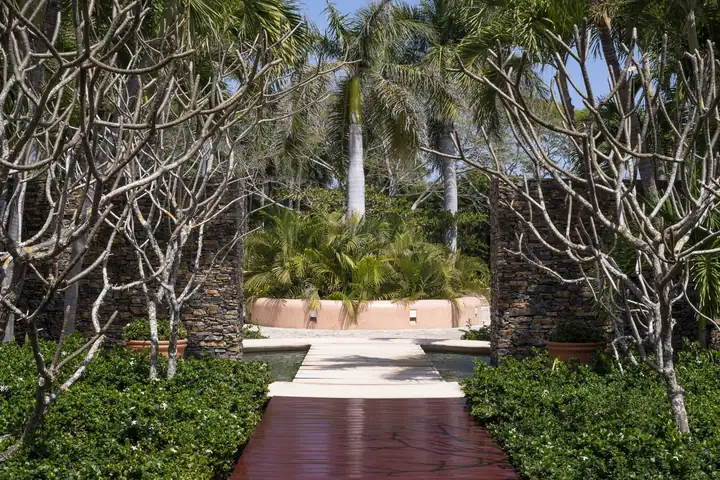 A garden path through the tropical courtyard between the guest wings