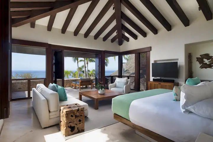 Master Suite 3: the king bedroom with windows on the ocean